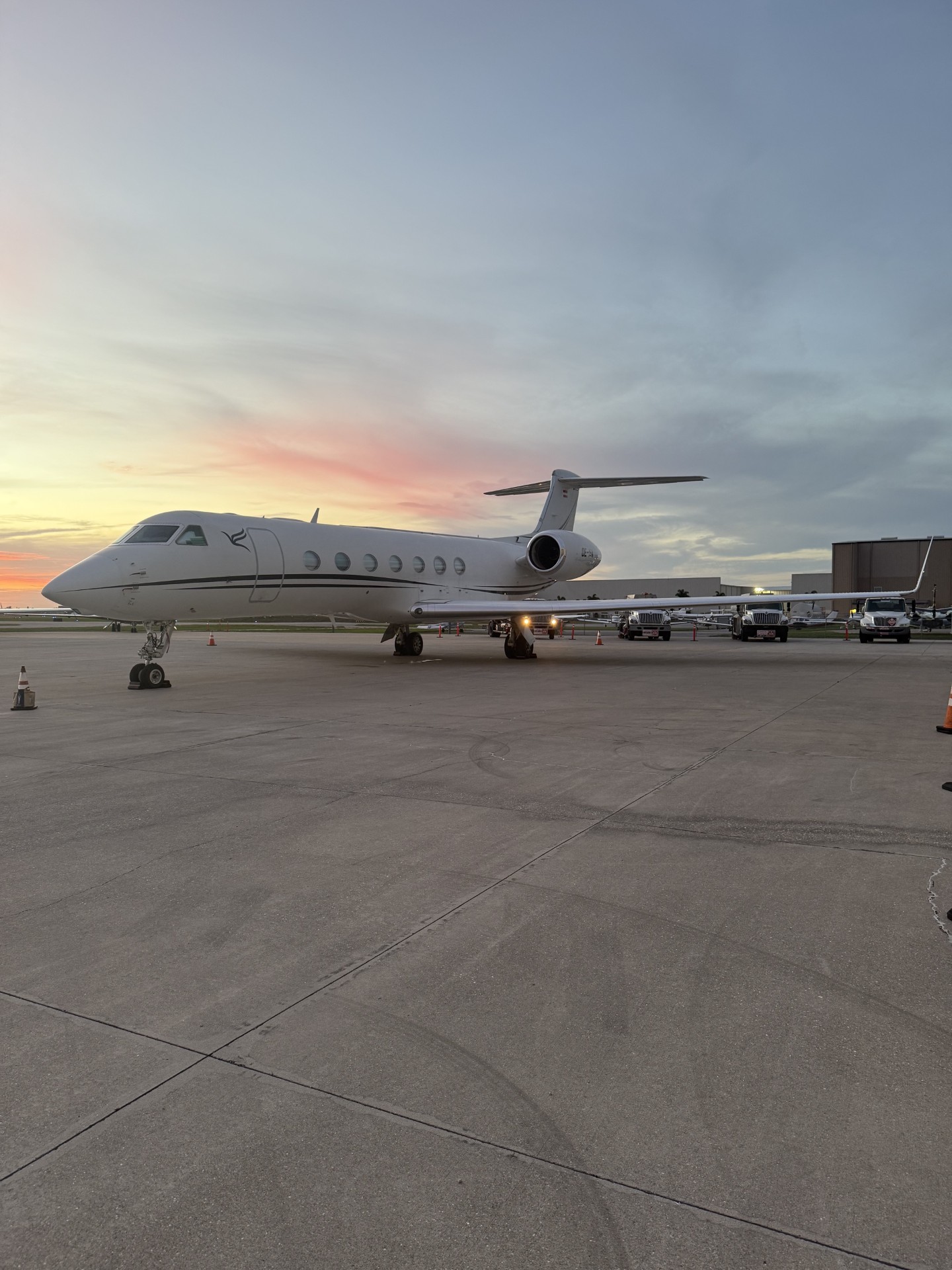 Dassault Falcon 7X large-cabin trijet on a sunlit ramp